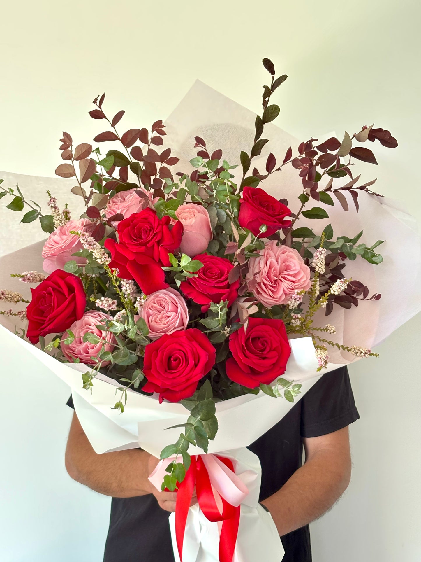 Dozen red and pink roses bouquet