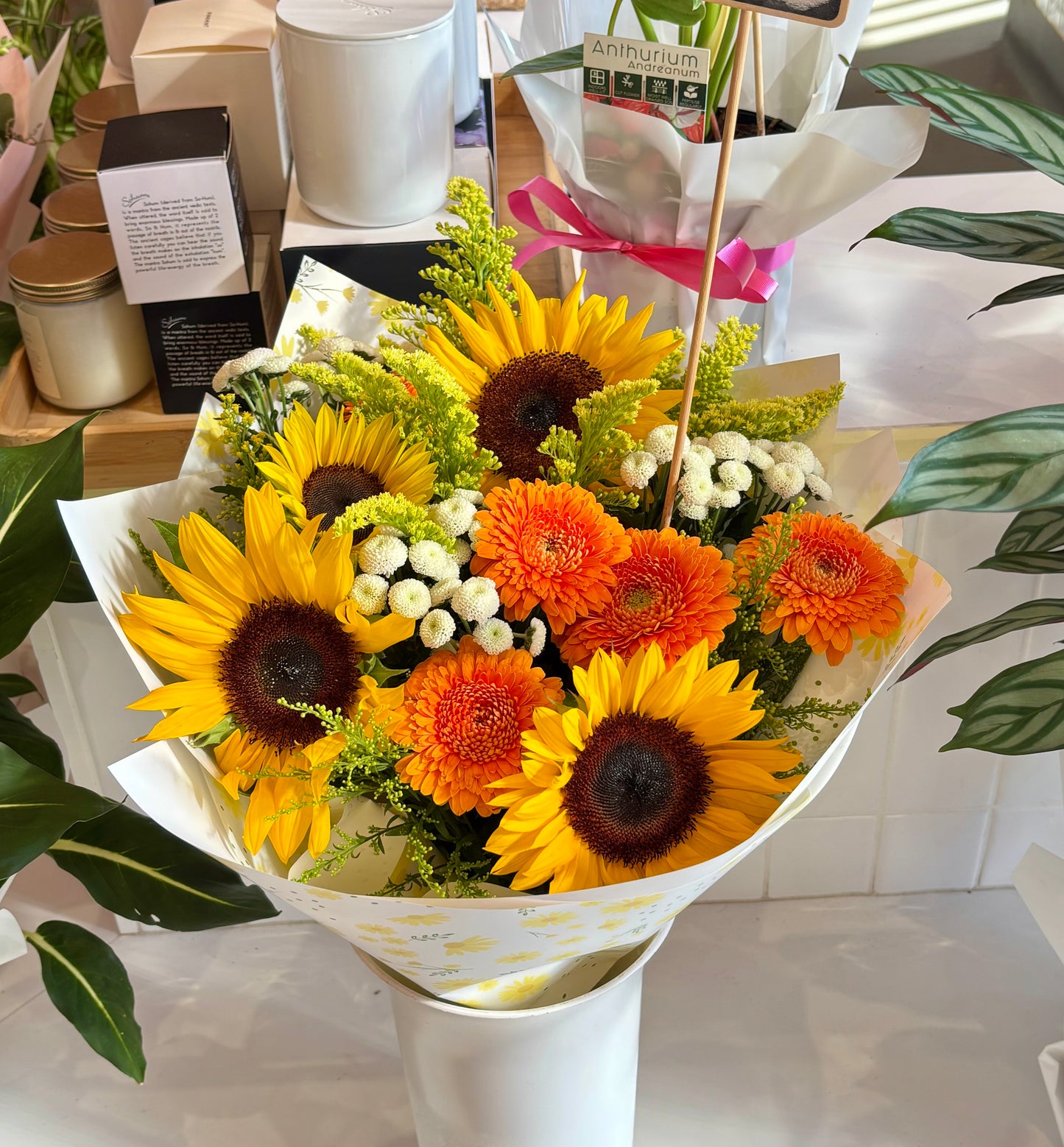 Bouquet of sunflowers and orange gerberas